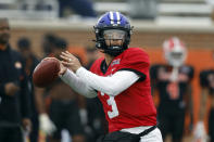 National quarterback Jaren Hall of BYU throws a pass during practice for the Senior Bowl NCAA college football game Thursday, Feb. 2, 2023, in Mobile, Ala.. (AP Photo/Butch Dill)