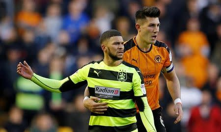 Britain Football Soccer - Wolverhampton Wanderers v Huddersfield Town - Sky Bet Championship - Molineux - 25/4/17Wolves’ Danny Bath in action with Huddersfield Town’s Nahki Wells Mandatory Credit: Action Images / Andrew CouldridgeLivepic