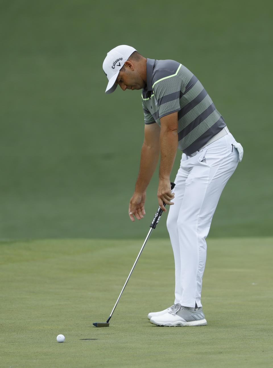 Sergio Garcia, of Spain, reacts to a missed putt on the second hole during the second round for the Masters golf tournament Friday, April 12, 2019, in Augusta, Ga. (AP Photo/Matt Slocum)