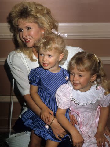 <p>Donaldson Collection/Michael Ochs Archives/Getty</p> Kathy, Nicky and Paris Hilton in Los Angeles circa 1985.