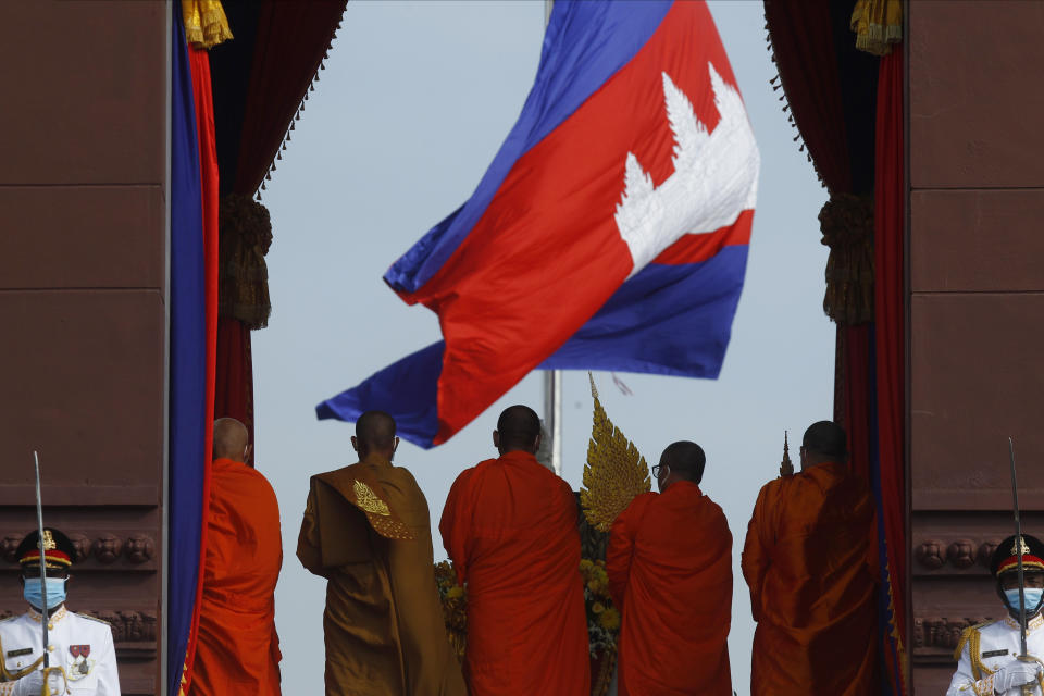 Cambodian Buddhist monks participate in the country's 67th Independence Day celebration, in Phnom Penh, Cambodia, Monday, Nov. 9, 2020. (AP Photo/Heng Sinith)