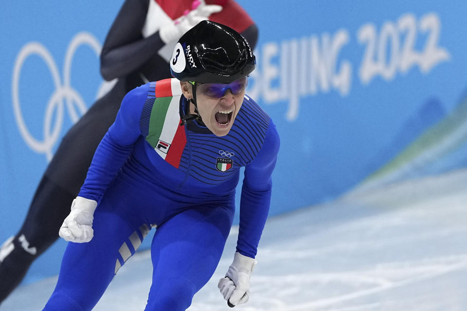 Arianna Fontana of Italy, celebrates after winning the final of the women's 500-meter during the short track speedskating competition at the 2022 Winter Olympics, Monday, Feb. 7, 2022, in Beijing.(AP Photo/David J. Phillip)