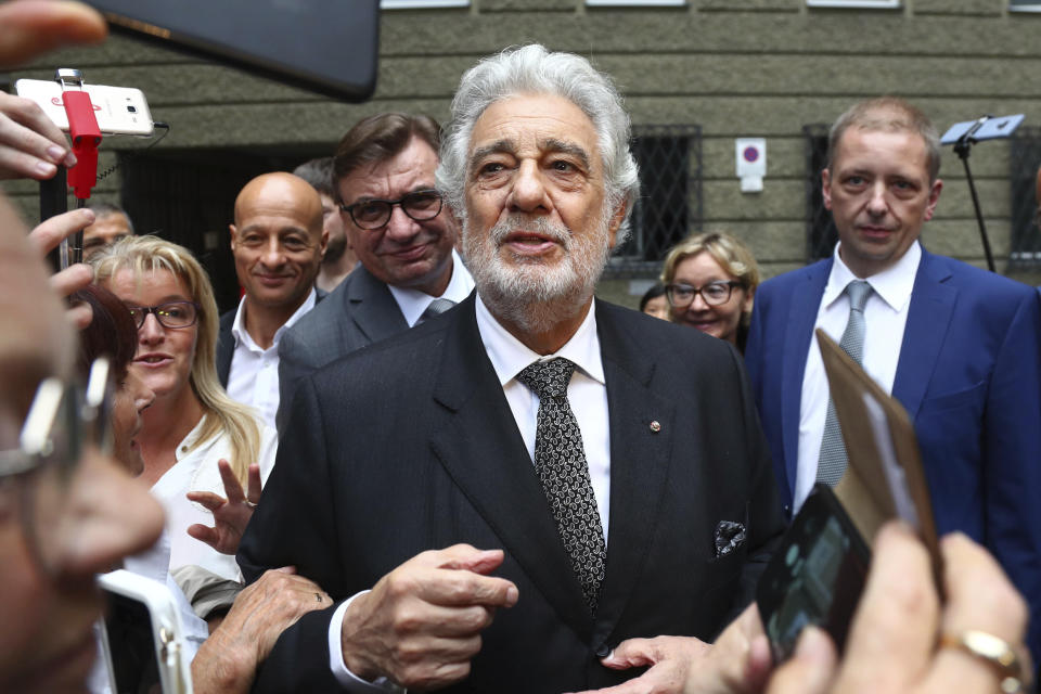 FILE - In this Aug. 25, 2019 file photo, Placido Domingo talks to fans at the "Festspielhaus" opera house after he performed "Luisa Miller" by Giuseppe Verdi in Salzburg, Austria. The cancellation Tuesday, Sept. 24, 2019, of Domingo's Metropolitan Opera performance in "Macbeth" means the singer, who has been accused by multiple women of sexual misconduct, has only a few U.S. shows scheduled, all set for California in 2020. Domingo has said he strongly disputes the allegations made against him. (AP Photo/Matthias Schrader, File)