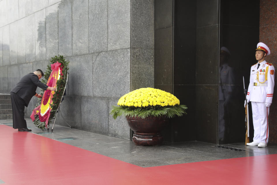 North Korean leader Kim Jong Un, left, attends a wreath laying ceremony at Ho Chi Minh Mausoleum in Hanoi, Vietnam Saturday, March 2, 2019. (Jorge Silva/Pool Photo via AP)