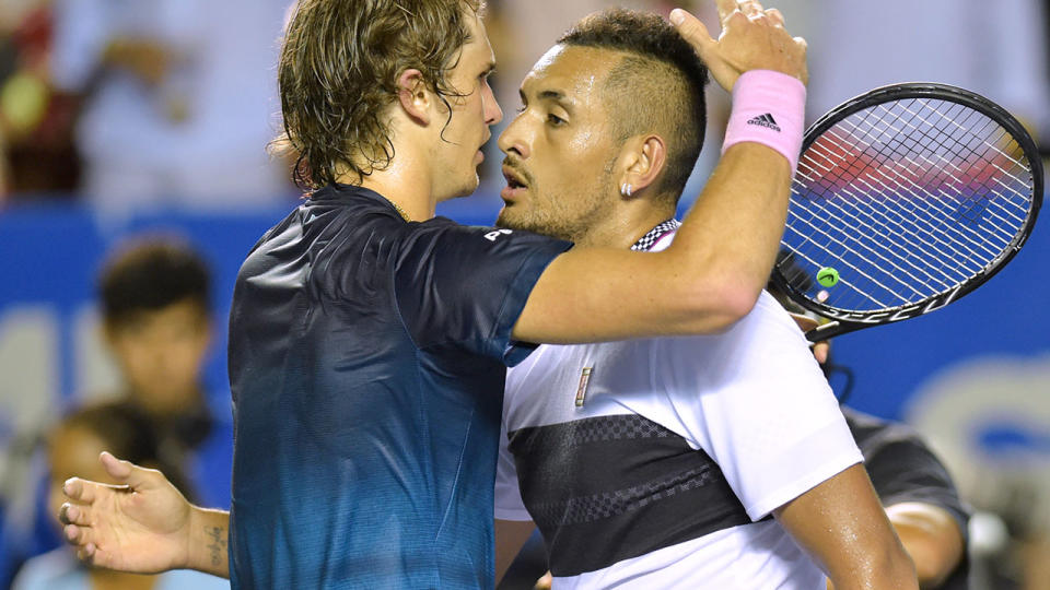 Nick Kyrgios hugs Alexander Zverev after winning their Mexico ATP Open men’s singles tennis final. (Photo by PEDRO PARDO/AFP/Getty Images)