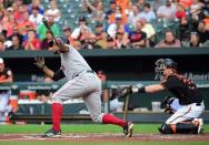 Aug 10, 2018; Baltimore, MD, USA; Boston Red Sox shortstop Xander Bogaerts (2) hits a home run in the first inning against the Baltimore Orioles at Oriole Park at Camden Yards. Mandatory Credit: Evan Habeeb-USA TODAY Sports