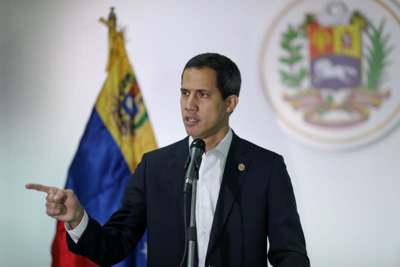 Venezuelan opposition leader Juan Guaido, who many nations have recognised as the country's rightful interim ruler, speaks during a news conference in Caracas