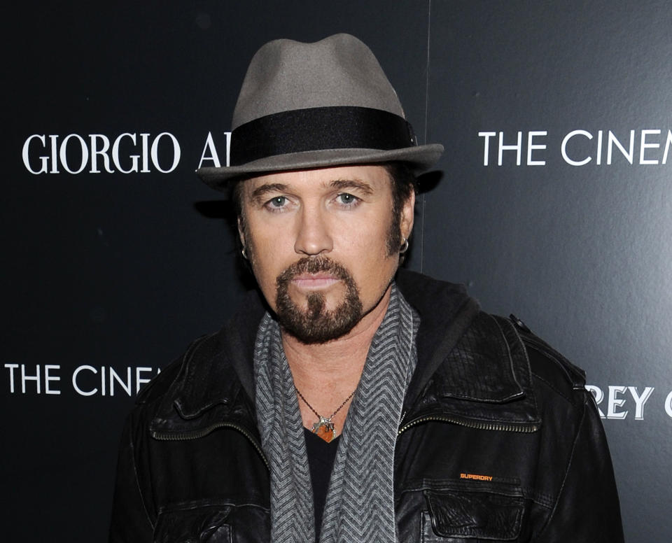 FILE - This Dec. 13, 2011 file photo shows singer Billy Ray Cyrus attending a special screening of "Albert Nobbs" at the Museum of Modern Art in New York. Cyrus is making his Broadway debut in "Chicago." The singer of "Achy Breaky Heart" and father of Miley Cyrus is detouring from his Nashville roots in taking on the role of criminal lawyer Billy Flynn for a seven-week engagement beginning Nov. 5. (AP Photo/Evan Agostini, file)