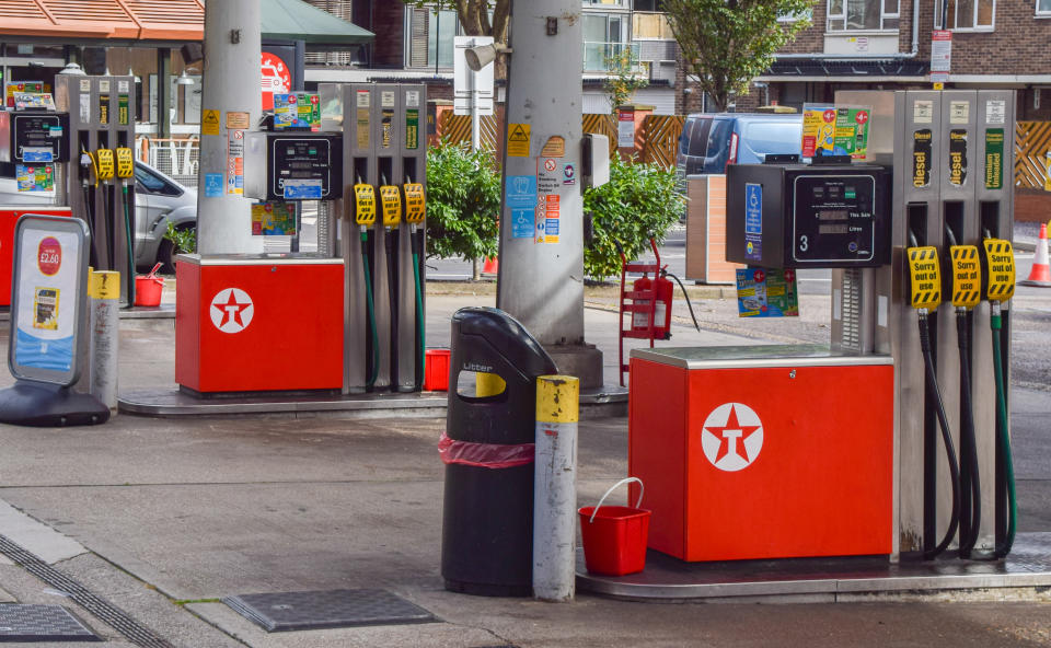 LONDON, UNITED KINGDOM - 2021/09/30: 'Sorry Out Of Use' signs cover petrol pumps at a Texaco station in central London which ran out of fuel after reopening for just one day. 
Many stations have run out of petrol due to a shortage of truck drivers linked to Brexit, along with panic buying. (Photo by Vuk Valcic/SOPA Images/LightRocket via Getty Images)