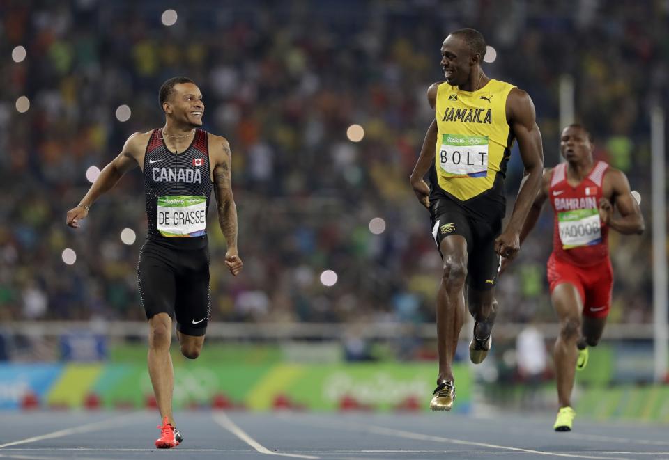 <p>Andre De Grasse led the charge for Canada’s track and field resurgence in Rio, powered by bravado and youthful exuberance. His haul? Three Olympic medals, a silver and two bronzes, and an iconic photo with Usain Bolt at the finish line of the 200m semifinal that will stand as one of the lasting images from the Games. (AP Photo/David J. Phillip) </p>