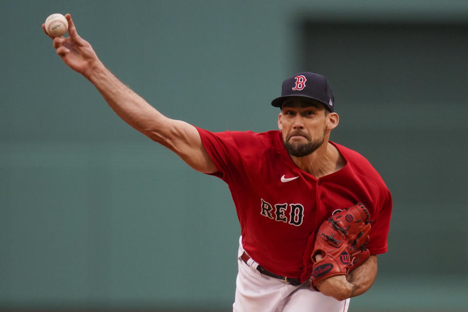 Boston Red Sox pitcher Nathan Eovaldi (17) delivers against the Tampa Bay Rays during the first inning during game 3 of a baseball American League Division Series, Sunday, Oct. 10, 2021, in Boston. (AP Photo/Charles Krupa)