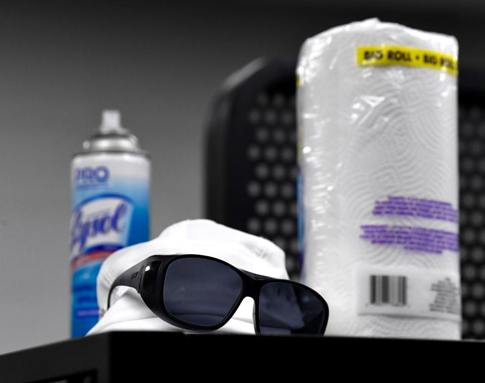 Sunglasses and cleaning products sit atop a cabinet in one of the dormitories at the Abilene Salvation Army. Maintaining cleanliness is an all-hands effort at the facility.