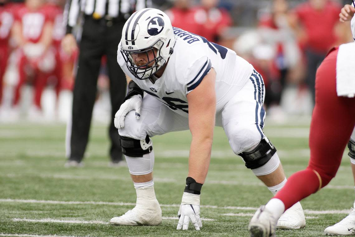 BYU offensive lineman Clark Barrington lines up for a play during the second half of an NCAA college football game against Washington State, Saturday, Oct. 23, 2021, in Pullman, Wash. (AP Photo/Young Kwak)