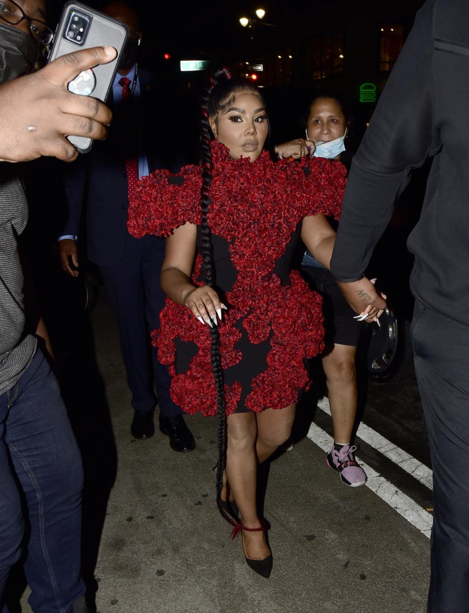 Lil’ Kim leaves Gotham Hall after attending Christian Siriano’s Spring 2022 fashion show. - Credit: MEGA