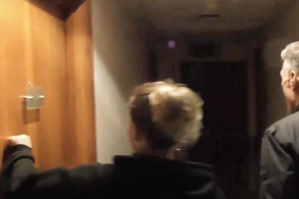 Britain First organiser Ashlea Simon knocking on a hotel room door (Ashlea Simon/YouTube)