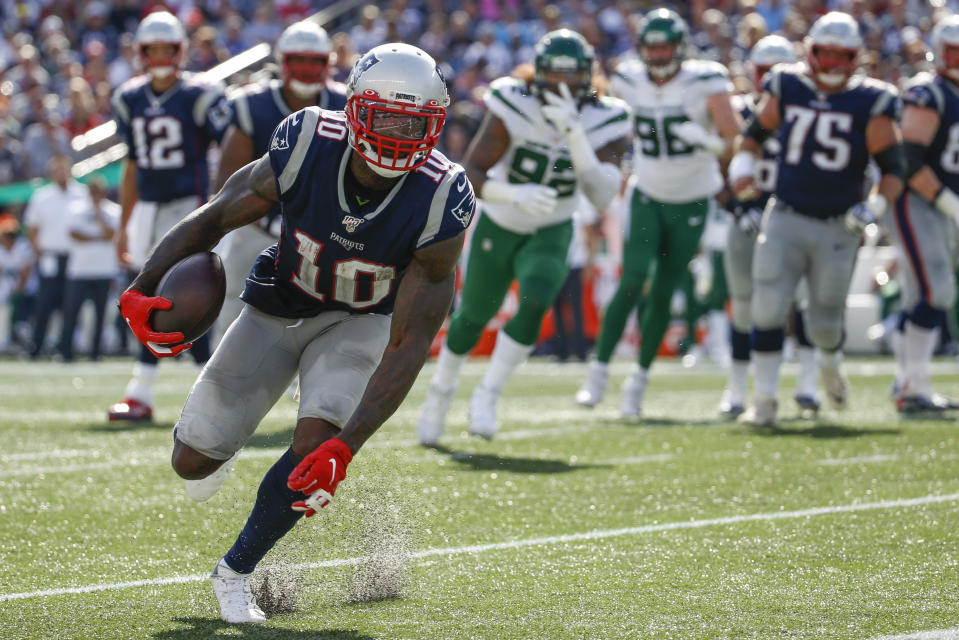 Sep 22, 2019; Foxborough, MA, USA; New England Patriots wide receiver Josh Gordon (10) carries the ball during the second half against the New York Jets at Gillette Stadium. Mandatory Credit: Greg M. Cooper-USA TODAY Sports