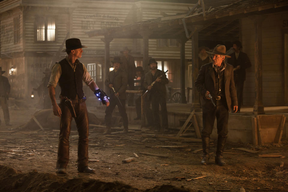 Craig and Ford survey the damage after an alien attack in a scene from Cowboys & Aliens (Photo: Universal Pictures/Courtesy Everett Collection)