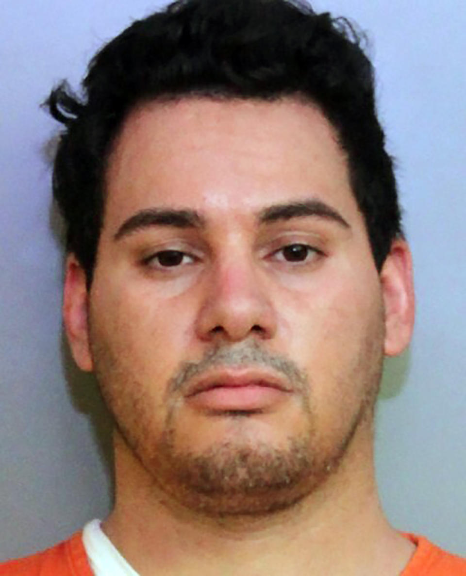 This undated photo provided by the Polk County Sheriff's Office, in Florida, shows Joshua Colon. On Tuesday, Jan. 26, 2021, officials said that Colon, who had been recently named “Paramedic of the Year,” helped a supervisor steal COVID-19 vaccines meant for first responders. (Polk County Sheriff's Office via AP)