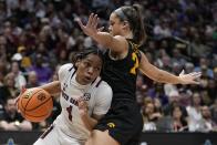 South Carolina's Zia Cooke tries to get past Iowa's Gabbie Marshall during the first half of an NCAA Women's Final Four semifinals basketball game Friday, March 31, 2023, in Dallas. (AP Photo/Tony Gutierrez)