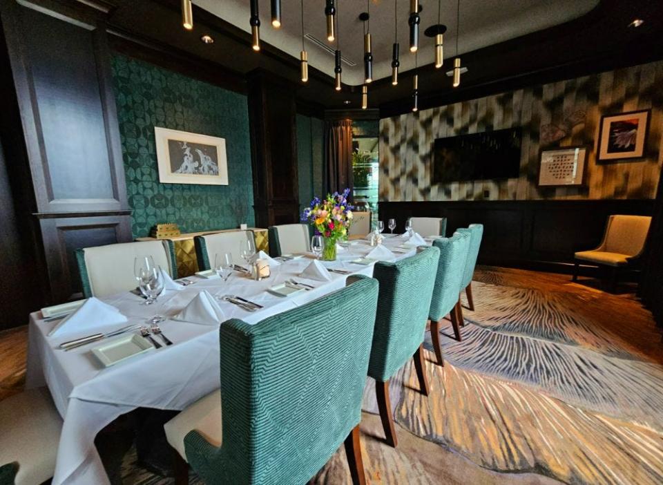 One of the private dining rooms at Ruth's Chris Steak House in West Des Moines offers seating for 18 and elegantly appointed design touches.