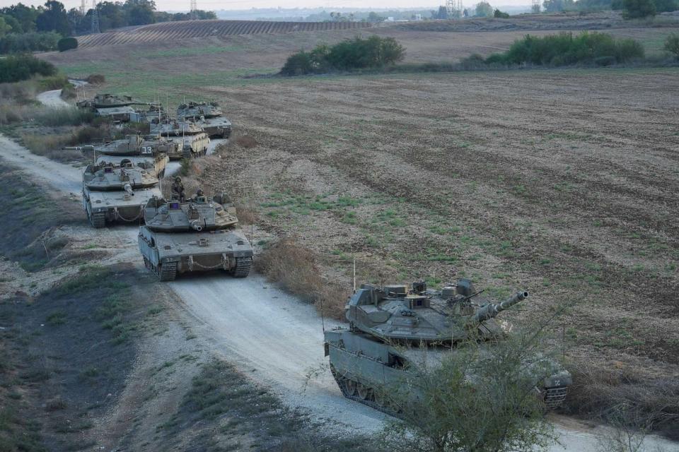 PHOTO: Israeli tanks move near the Israeli Gaza border, Israel, Oct. 11, 2023. (Erik Marmor/AP)