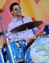 NEW ORLEANS, LA - APRIL 27: Actor John Stamos joins The Beach Boys on stage and performs during the 2012 New Orleans Jazz & Heritage Festival Presented by Shell at the Fair Grounds Race Course on April 27, 2012 in New Orleans, Louisiana. (Photo by Rick Diamond/Getty Images)