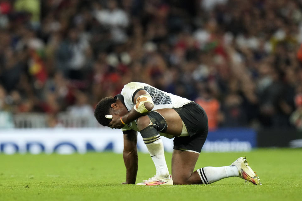 Fiji's Vinaya Habosi reacts after the end of the Rugby World Cup Pool C match between Fiji and Portugal, at the Stadium de Toulouse in Toulouse, France, Sunday, Oct. 8, 2023. (AP Photo/Pavel Golovkin)