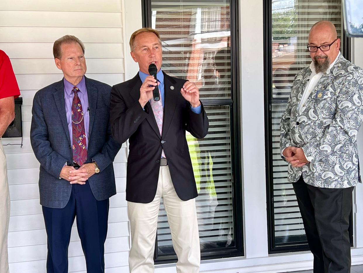 Spring Hill Mayor Jim Hagaman, center, speaks at the dedication of The King's Daughters' School's newest residential home on Tuesday, Aug. 8, 2023.