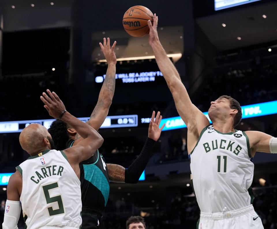 Milwaukee Bucks center Brook Lopez blocks a shot by Portland Trail Blazers guard Anfernee Simons on Nov. 21 at Fiserv Forum. Lopez had five blocks in the game.