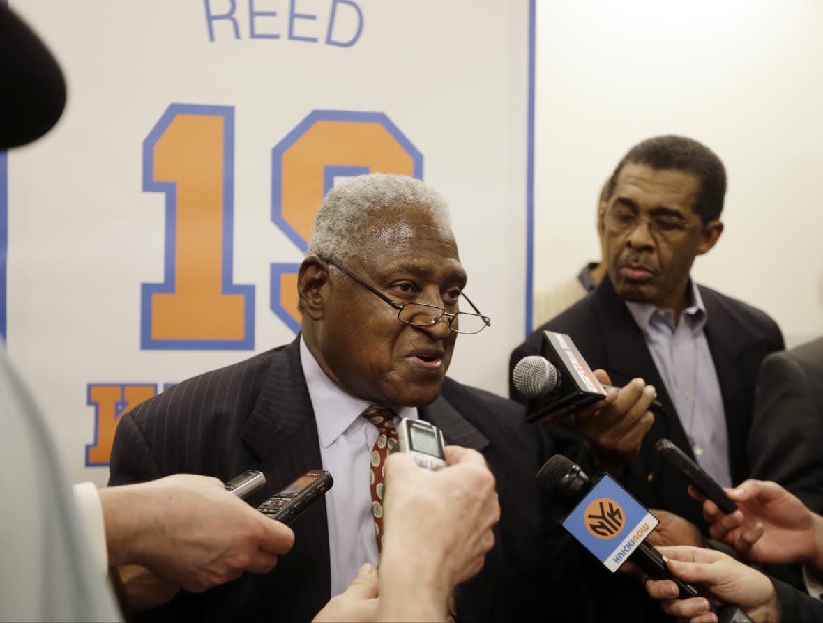 FILE – New York Knicks Hall-of-Famer Willis Reed responds to questions during an interview before an NBA basketball game between the Knicks and the Milwaukee Bucks, Friday, April 5, 2013, in New York. Willis Reed, who dramatically emerged from the locker room minutes before Game 7 of the 1970 NBA Finals to spark the New York Knicks to their first championship and create one of sports’ most enduring examples of playing through pain, died Tuesday, March 21, 2023. He was 80. Reed’s death was announced by the National Basketball Retired Players Association, which confirmed it through his family. (AP Photo/Frank Franklin II, File)