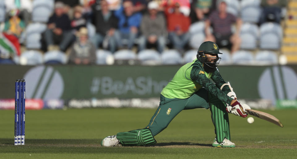 South Africa's Hashim Amla in action against Afghanistan during the ICC Cricket World Cup group stage match at The Cardiff Wales Stadium in Cardiff, Wales, Saturday June 15, 2019. (David Davies/PA via AP)