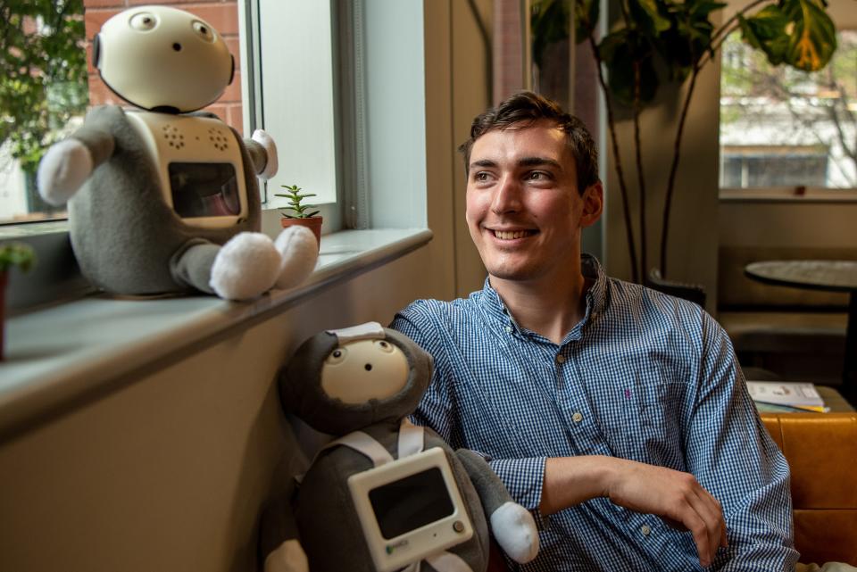 Jacob Boyle, the founder and CEO of MARCo Technologies LLC, poses for a photo with Marco, a mental health assisting robot, in Newark, NJ on Friday May 6, 2022.