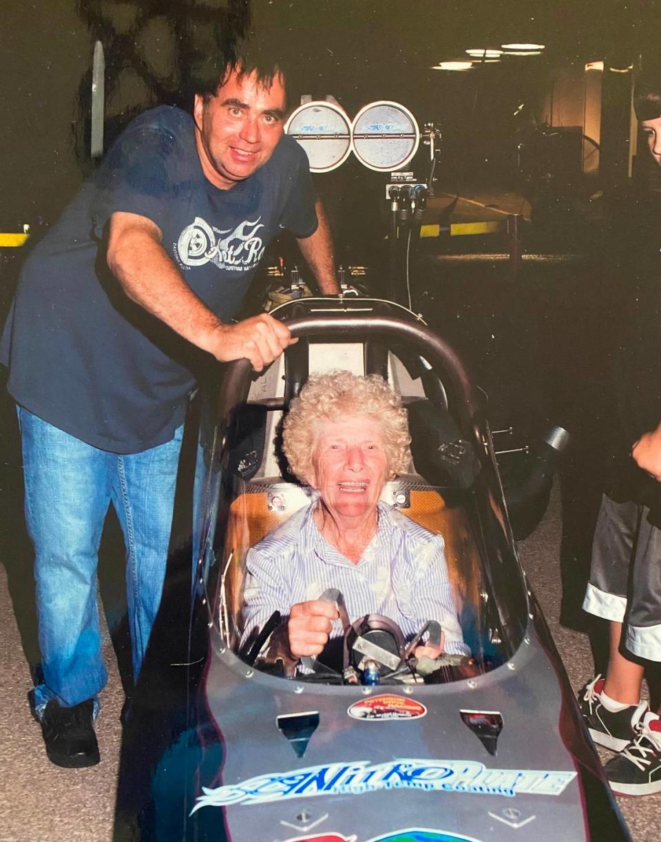 Racer Scott Palmer with the late Kansas International Dragway owner Helen Simon. Courtesy photo