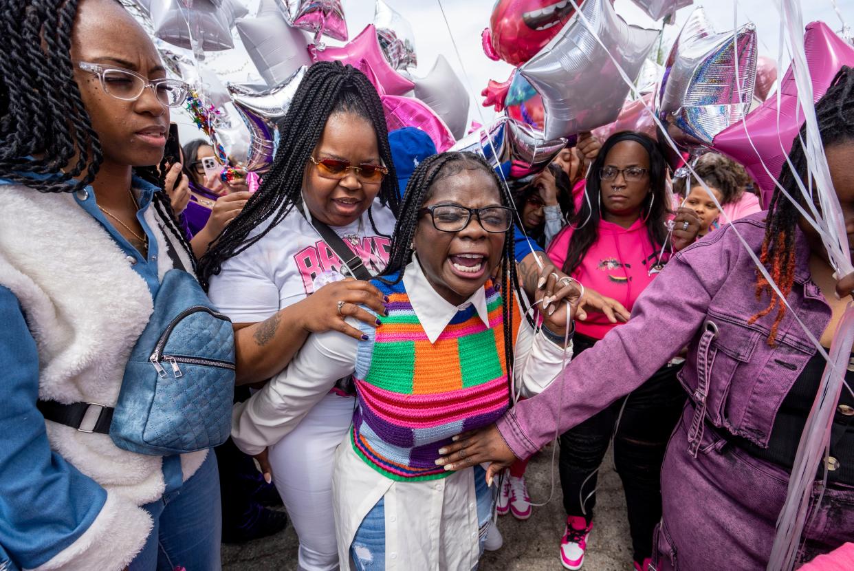 (Left) Erica Hymes, grandmother of Zekani Hymes-Wilson, holds (right) Neka Willis-Dorsey as she speaks at a balloon release at the scene of the accident, that killed the 4-year-old and injured her mother at the intersection of North Teutonia Avenue and West Vera Avenue, on Saturday May 4, 2024 in Milwaukee, Wis.