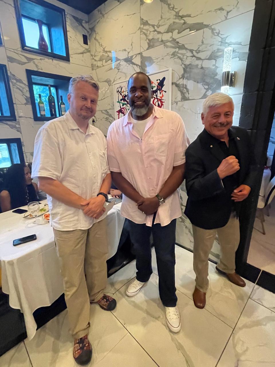 Kwame Kilpatrick poses for a photo with Free Press "On Guard" columnist M.L. Elrick and Republican activist Anthony Gusumano on June 24, 2024 after urging a gathering at Lelli's Inn on the Green in Farmington Hills to support Donald Trump for president.