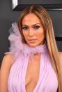 The eternally youthful Jennifer Lopez looked gorgeous when she walked onto the red carpet sporting this smokey purple eye look. She kept her hair in her trademark poker straight style, leaving her dewy make-up to shine.