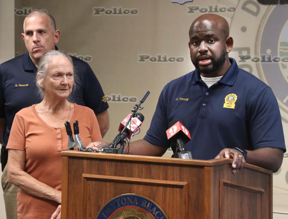 Daytona Beach Police Chief Jakari Young speaks to the media with Wanda Hinson, the sister of murder victim Linda Lois Little, and Detective David Dinardi, Tuesday, Oct. 25, 2022, about the cold case indictment of Michael Townson in Little's killing 31 years ago in Daytona Beach.