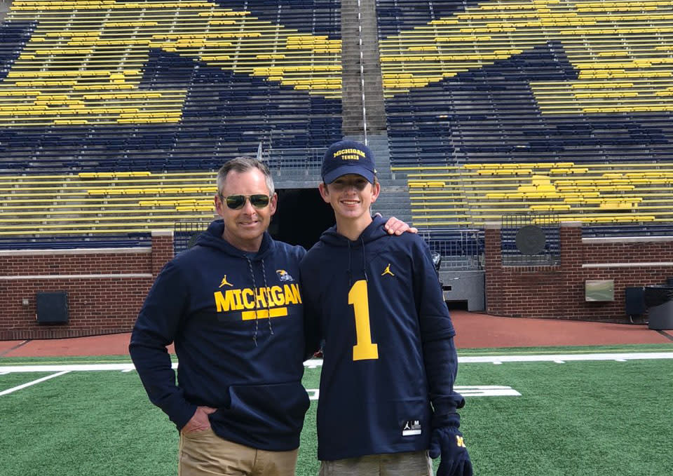 Tom Mars (L, shown with his son Thomas) is a big reason why Michigan is in College Football Playoff contention this season. (Photo credit: Mars family)