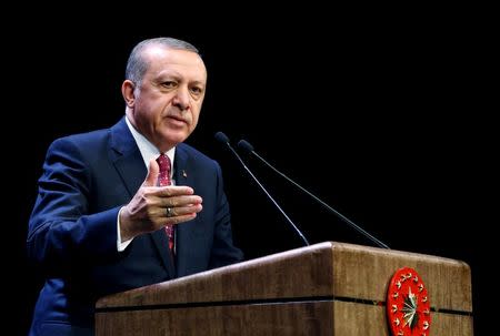 Turkish President Tayyip Erdogan makes a speech during a meeting at the Presidential Palace in Ankara, Turkey, August 24, 2016. Kayhan Ozer/Presidential Palace/Handout via REUTERS