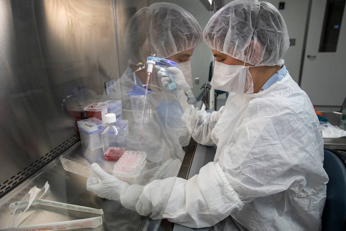 A technician works at UNC Lineberger’s advanced cellular therapeutics facility.