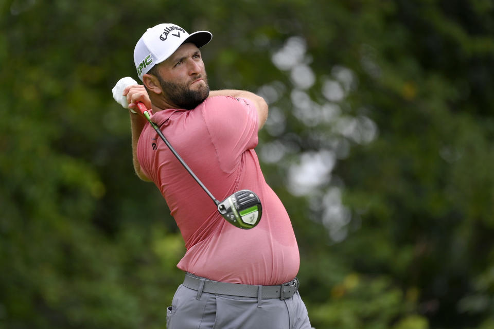 Jon Rahm, of Spain, tees off from the fifth hole during the final round of the BMW Championship golf tournament, Sunday, Aug. 29, 2021, at Caves Valley Golf Club in Owings Mills, Md. (AP Photo/Nick Wass)