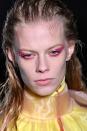 <p><strong>Trend: bejewelled eyeliner </strong></p><p>While there were a lot of barefaced beauties on the catwalk at Prada, the make-up artist Pat Mcgrath took some girls to another galaxy with extraterrestrial themed eye make-up. Mcgrath used her yet-to-launch eyeshadow palette, the Subversive: La Vie En Rose Eye Palette, to create glittering winged eyeliner in shades of purple, blue and pink - all studded with Swarovski crystals. </p>