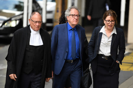 Australian actor Geoffrey Rush arrives at the Federal Court in Sydney, Australia October, 22, 2018. AAP/Dean Lewins/via REUTERS