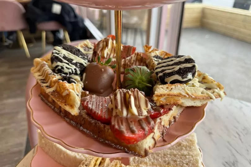 There's two varieties of waffles and milk-chocolate dipped strawberries at the centre