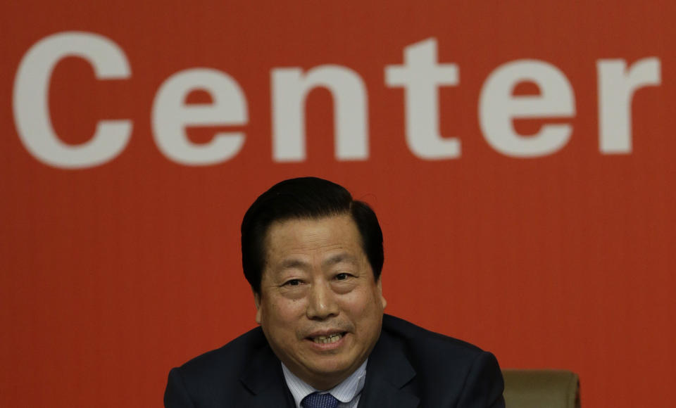 China's Minister for Environmental Protection Zhou Shengxian answers a reporter's question during a press conference at the media center of the 18th Chinese Communist Party Congress in Beijing Monday, Nov. 12, 2012. (AP Photo/Lee Jin-man)