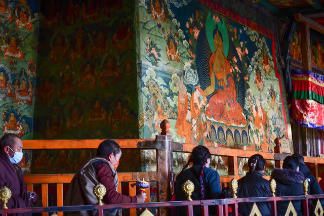 <p>Getty Images</p> Tourists visit the Jokhang Temple in Lhasa, Tibet Autonomous Region of China.