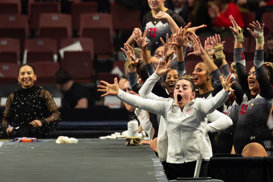 Utah Utes teammates celebrate after Camie Winger finishes her vault during the Sprouts Farmers Market Collegiate Quads at Maverik Center in West Valley on Saturday, Jan. 13, 2024. #1 Oklahoma, #2 Utah, #5 LSU, and #12 UCLA competed in the meet. | Megan Nielsen, Deseret News