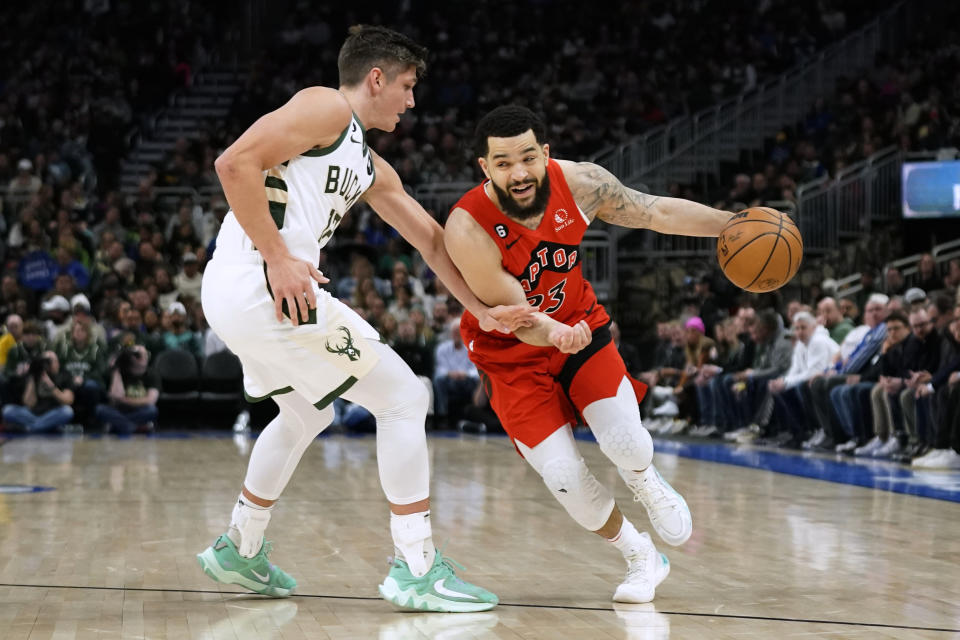 Toronto Raptors' Fred VanVleet (23) drives against Milwaukee Bucks' Grayson Allen during the first half of an NBA basketball game Sunday, March 19, 2023, in Milwaukee. (AP Photo/Aaron Gash)