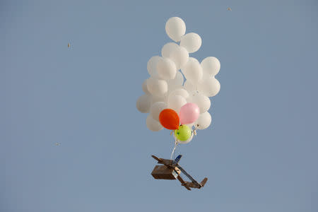 Balloons can be seen over the Israel-Gaza border as Palestinians protest on the Gaza side of the border, Israel October 19, 2018 REUTERS/Amir Cohen