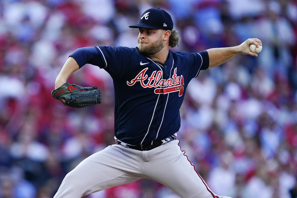 Atlanta Braves relief pitcher A.J. Minter (33) works during the sixth inning in Game 4 of baseball's National League Division Series between the Philadelphia Phillies and the Atlanta Braves, Saturday, Oct. 15, 2022, in Philadelphia. (AP Photo/Matt Rourke)